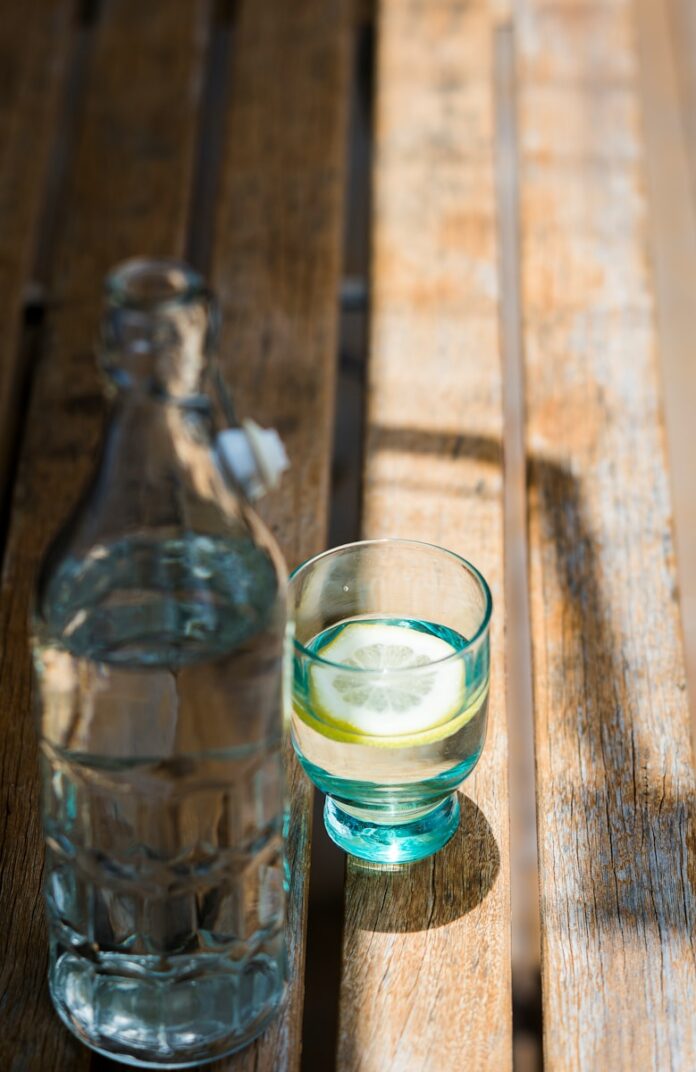 Photo by Tracey Hocking liquor in rock glass and bottle
